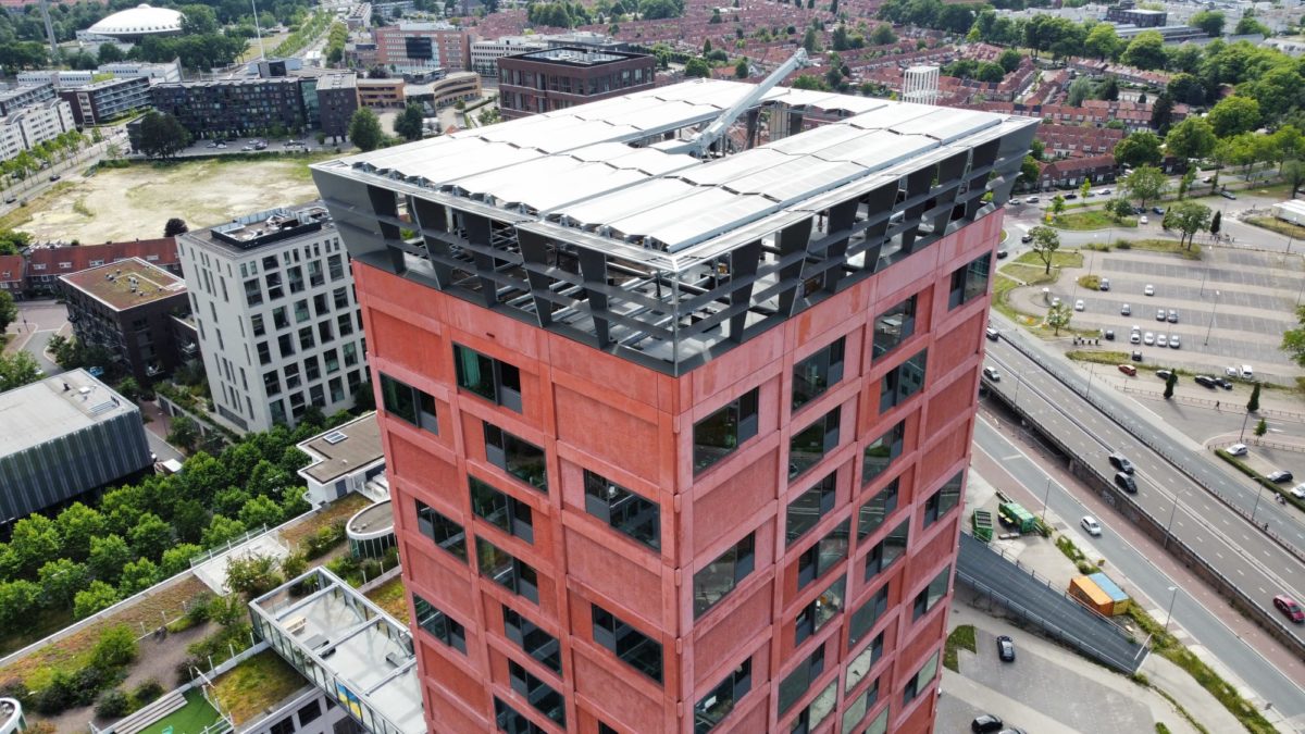 Rooftop system with PV panels, mini wind turbines in the Netherlands